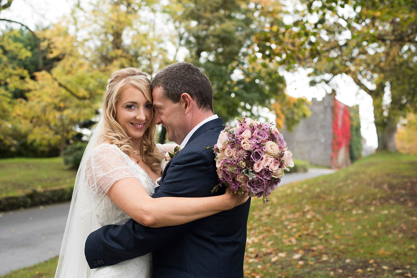 bride and groom in autumn at Durrow Castle Wedding