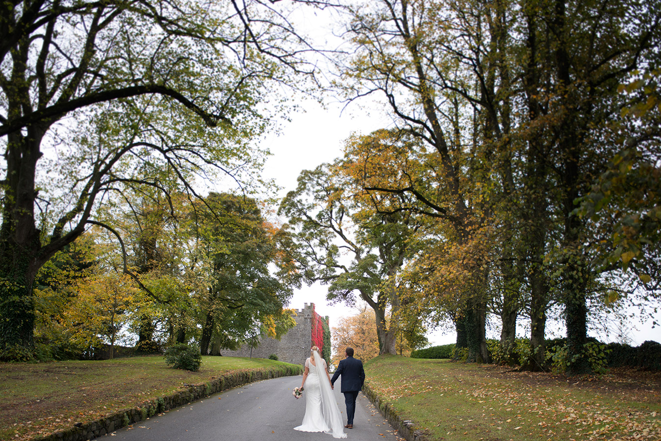 bride and groom in the driveway of Durrow Castle Wedding