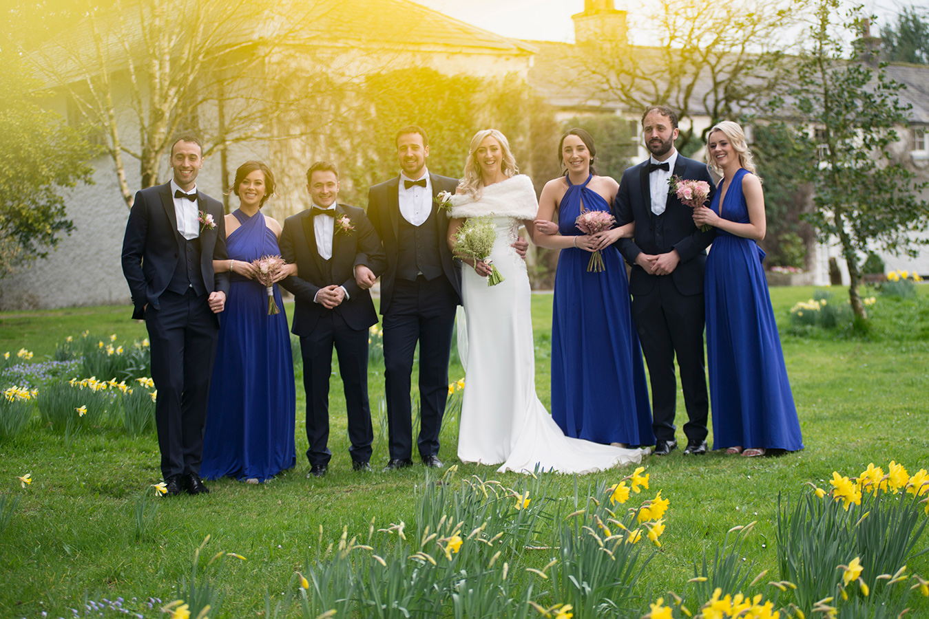 bridal party at rathsallagh house wedding with daffodils