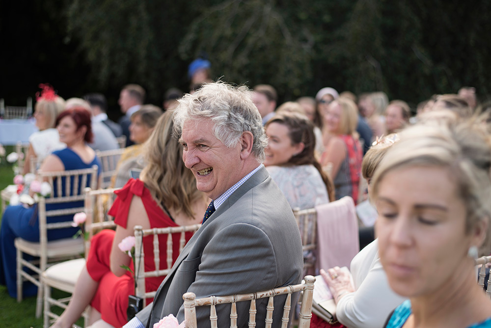 candid guests at outdoor wedding at Bellinter House