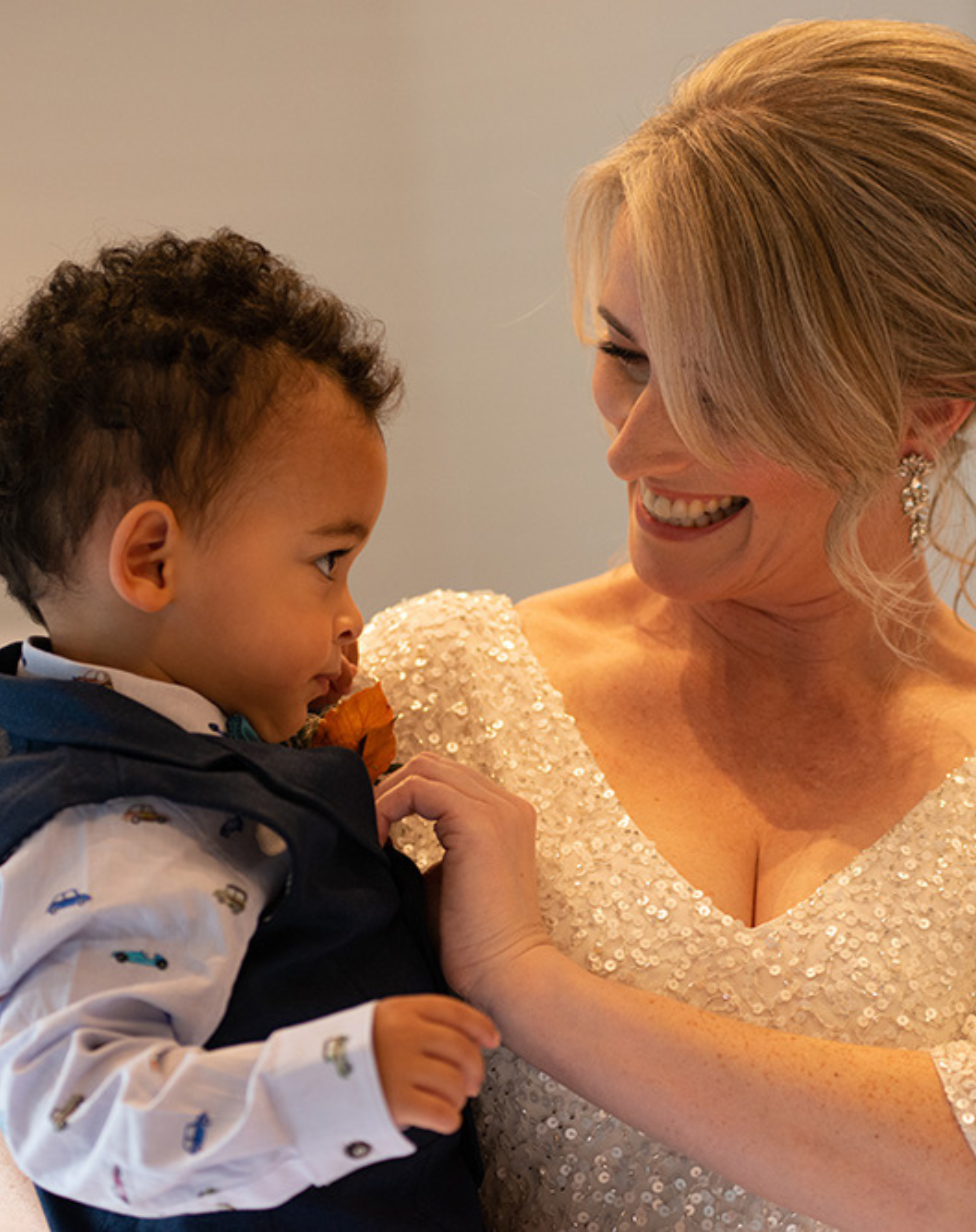Bride holding her son