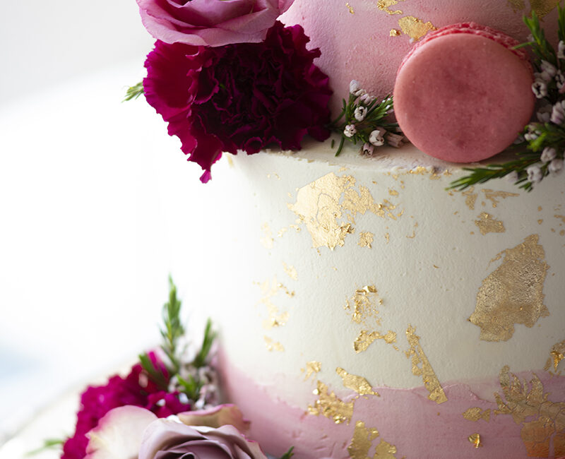 pink and gold wedding cake detail photo