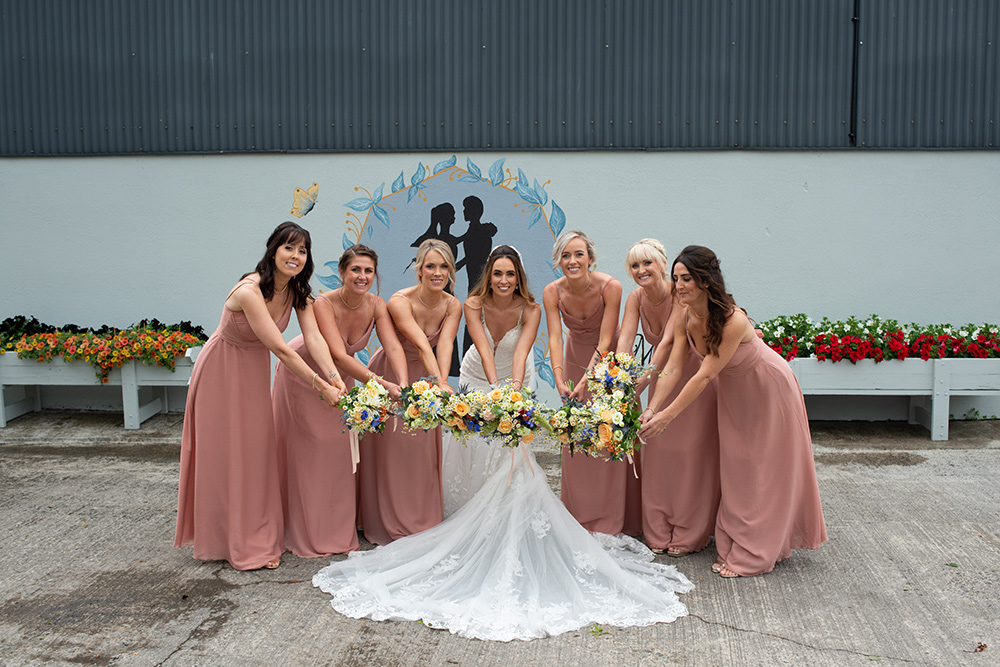 bridal party in peach wedding in Ireland