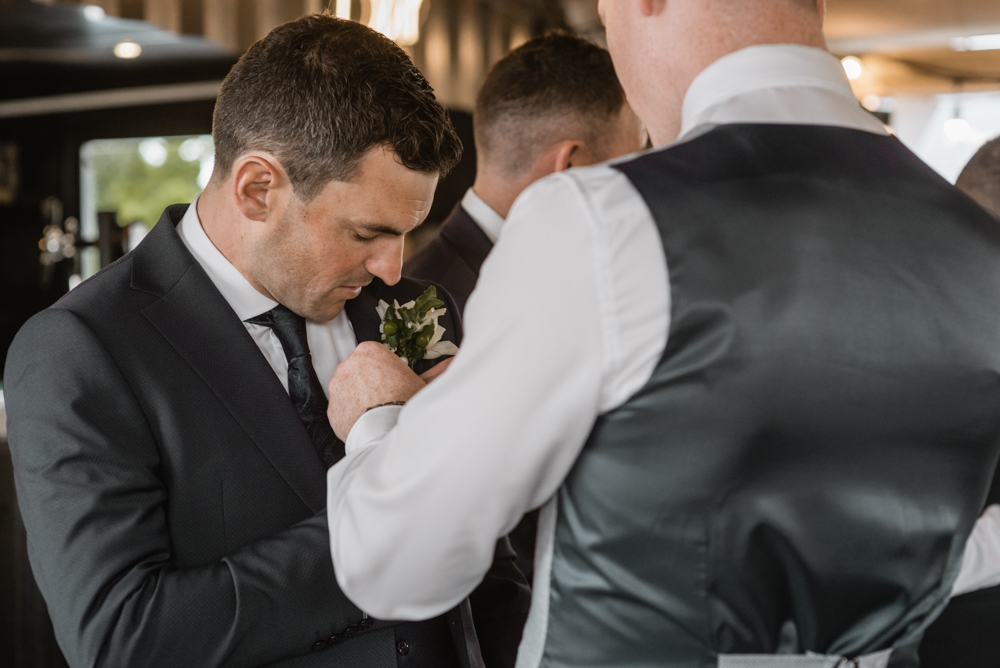 groomsmen get ready at wedding at Woodlands Hotel