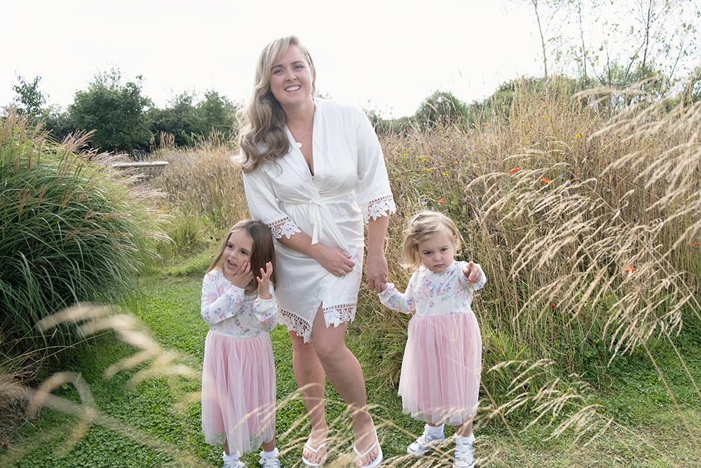 Bride with her daughters outside at Deeside Manor for real wedding Darver Castle