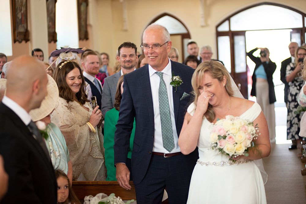 bride meets groom at wedding in Saint Michaels Church near Darver Castle wedding