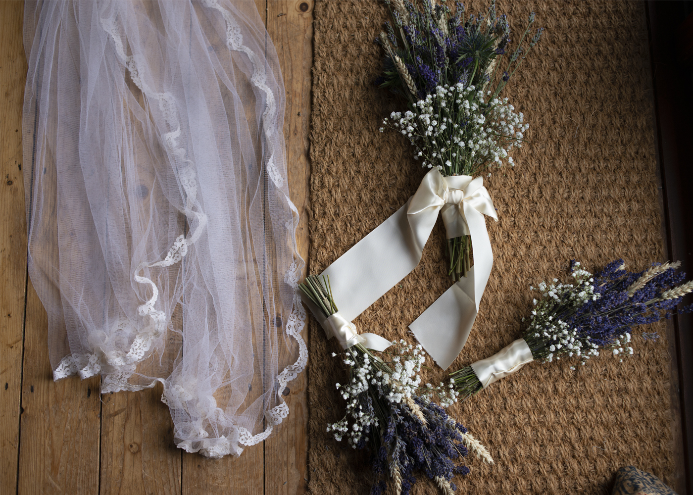 detail shot of veil and bouquets