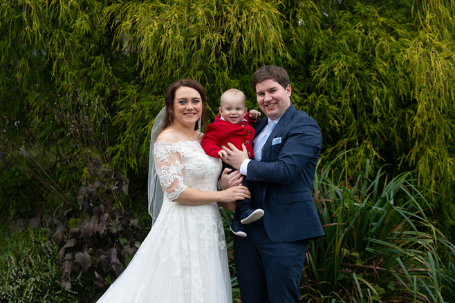 wedding couple with baby at wedding at Rathsallagh House