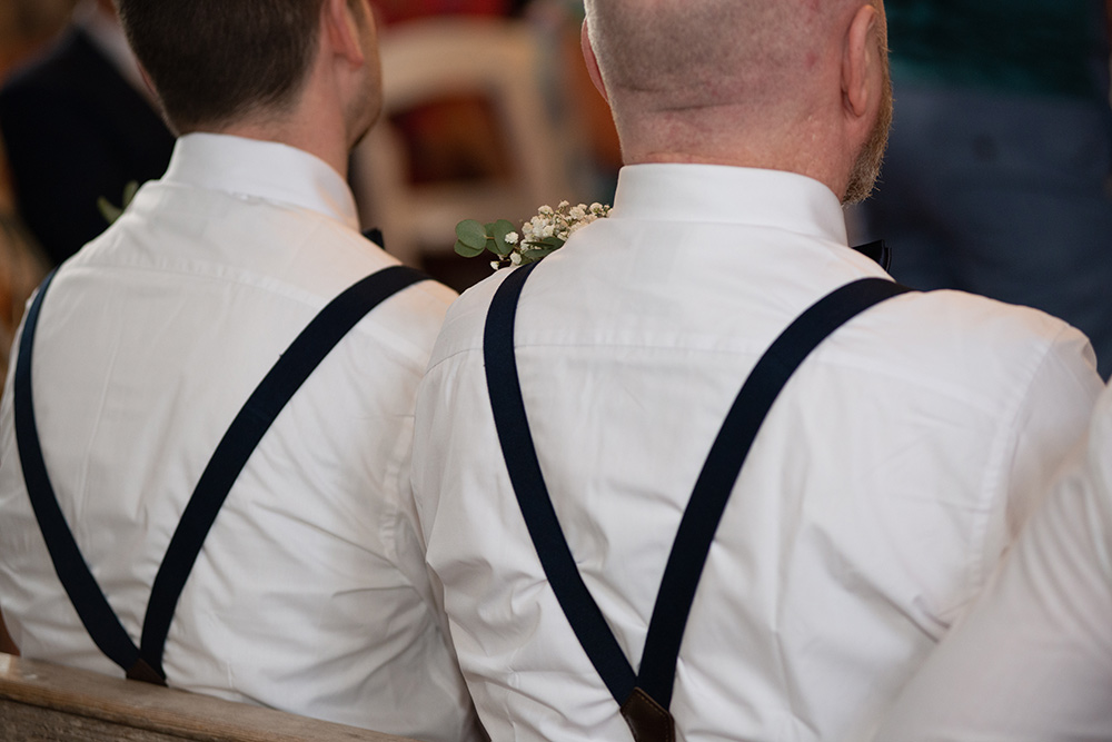 groom wears braces at Millhouse Slane wedding