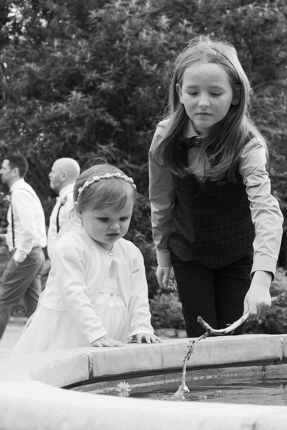 flower girls at fountain at Millhouse Slane wedding