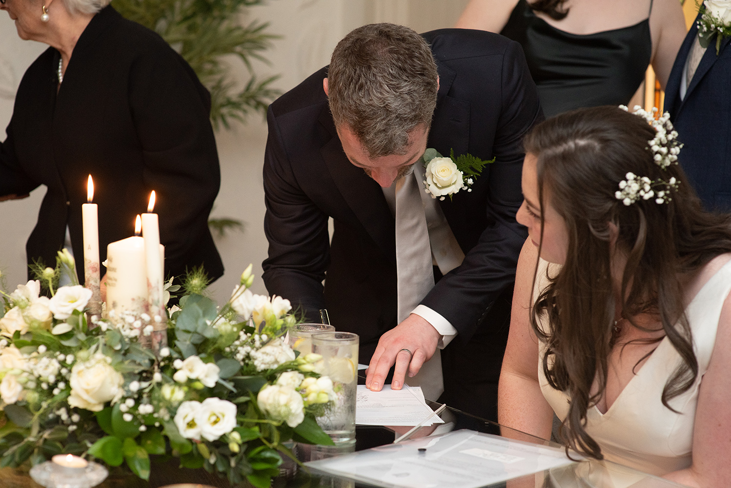 sigining the registry at wedding ceremony in Rathsallagh House