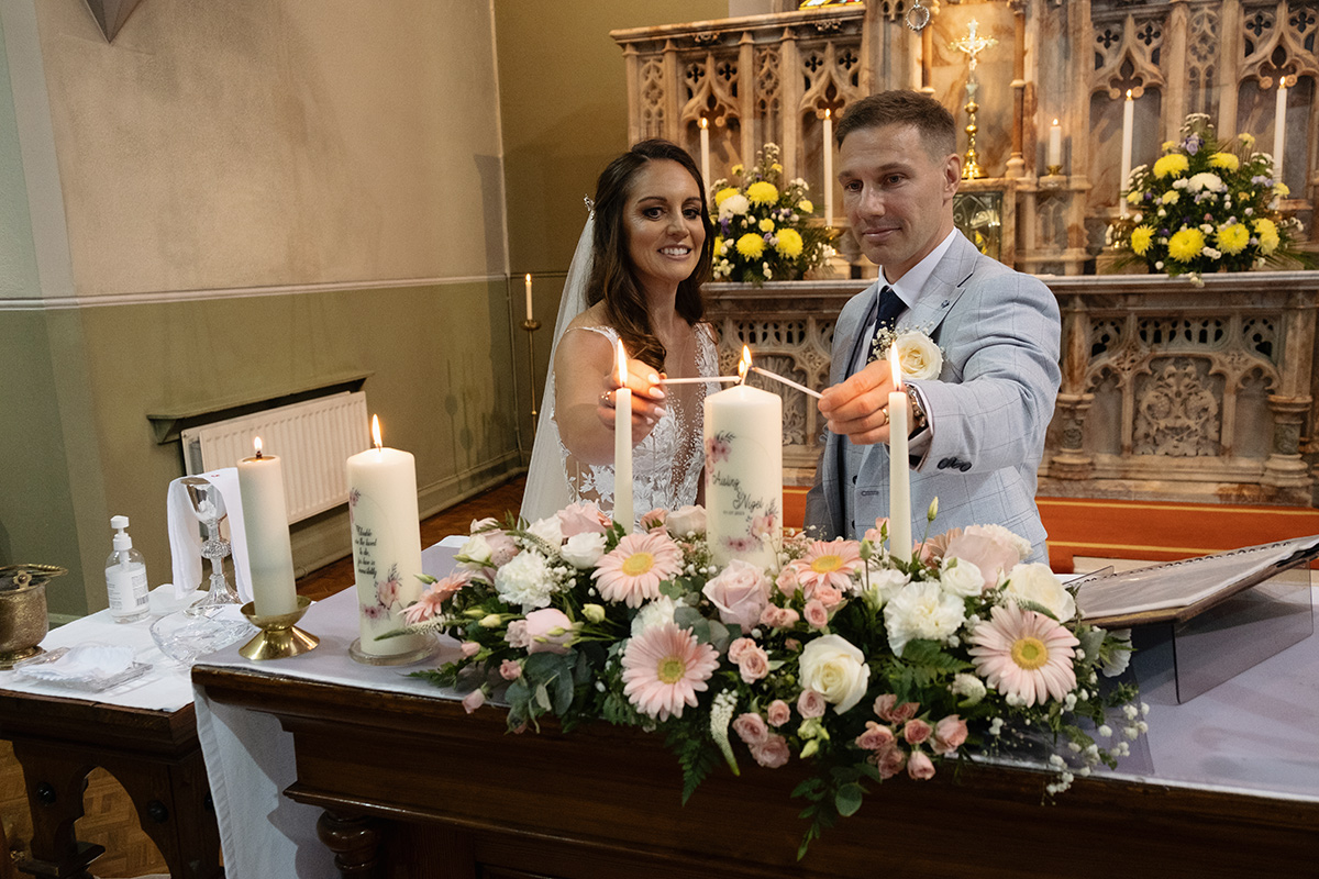 lighting the candles at wedding at Porterstown Church