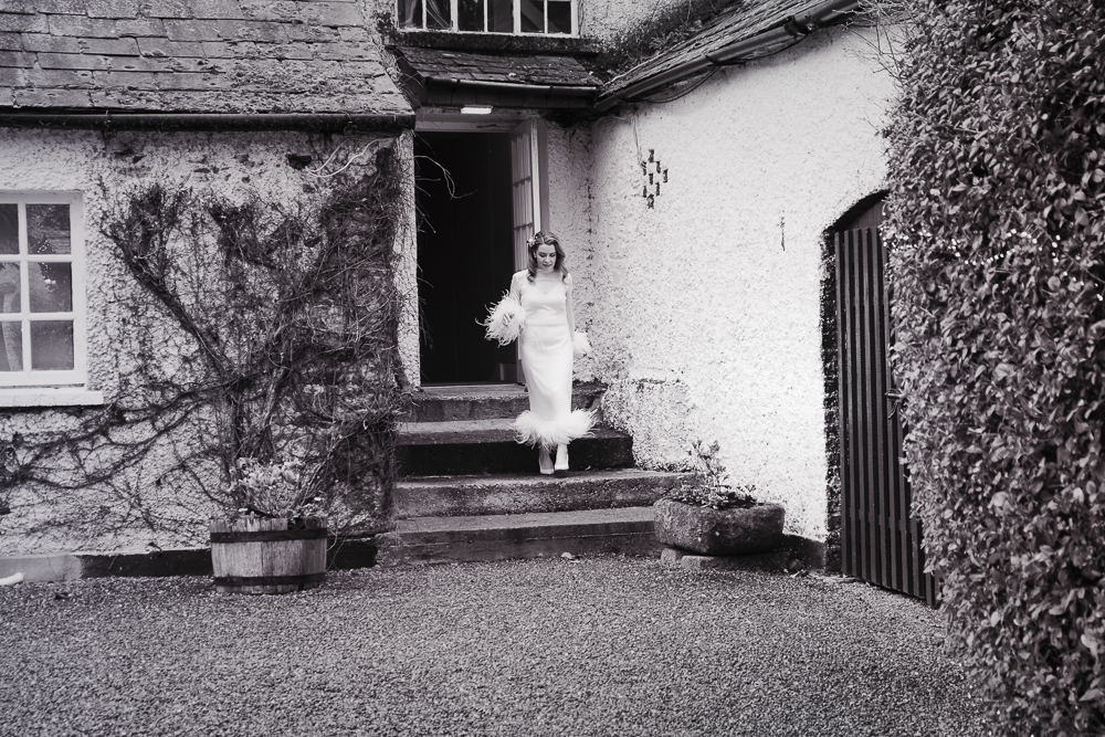 bride walking out for first look at Rathsallagh House